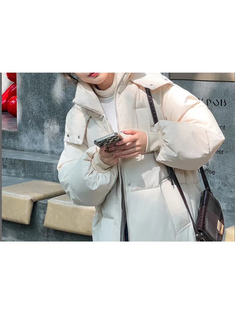 Damen Lange Oversized Steppwinterjacke mit Kapuze