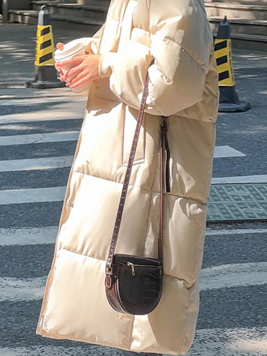 Damen Lange Oversized Steppwinterjacke mit Kapuze