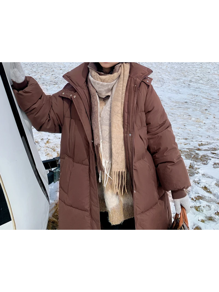 Damen Lange Oversized Steppwinterjacke mit Kapuze