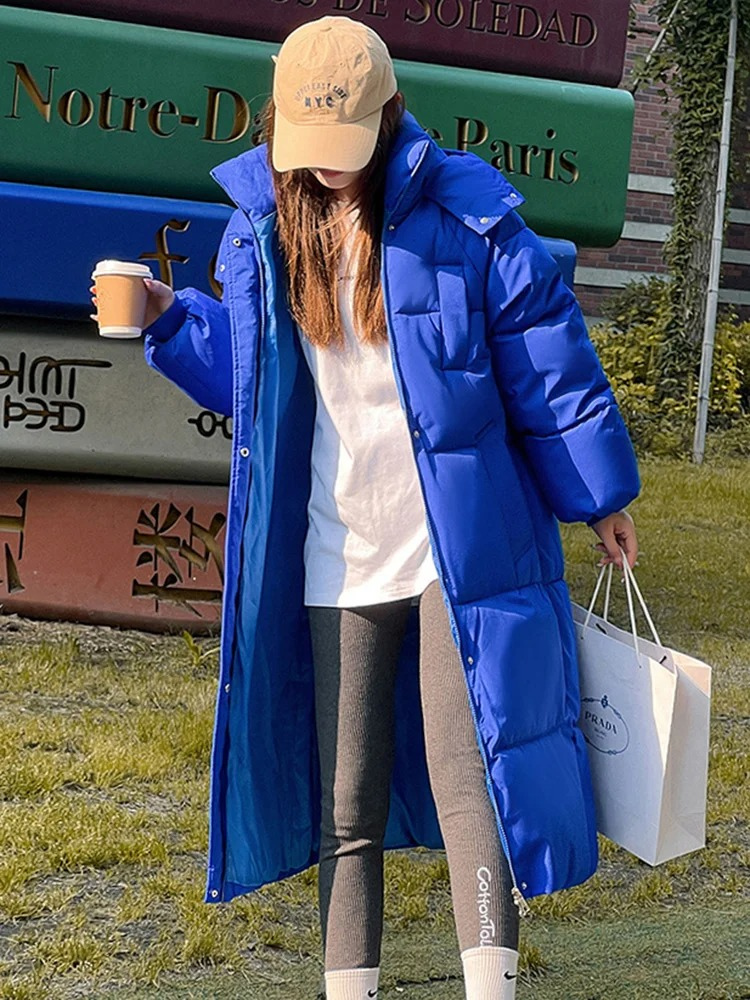 Damen Lange Oversized Steppwinterjacke mit Kapuze