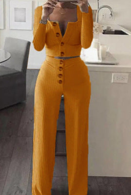 Damen Jumpsuit mit tiefem V-Ausschnitt und Knopfdetails Fudus