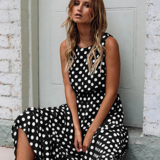 Damen Schwarzes Polka Dot Midikleid für Einen Retro Chic Look