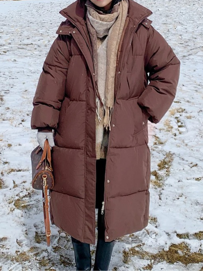 Damen Lange Oversized Steppwinterjacke mit Kapuze