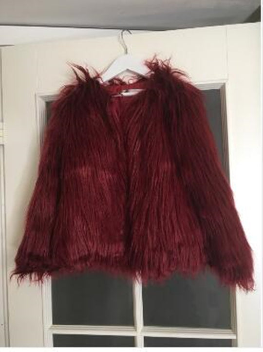 Damen Kunstfelljacke mit voluminösen Ärmel und lässigem Schnitt Fudus