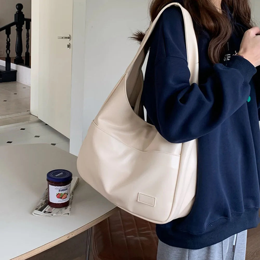 Damen Lederhandtasche mit breitem Riemen