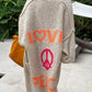 Strickcardigan Lang Love Peace Design