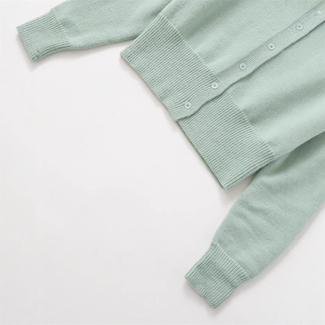 Damen Kurze Strickjacke mit Knopfverschluss und Rippdetails Fudus