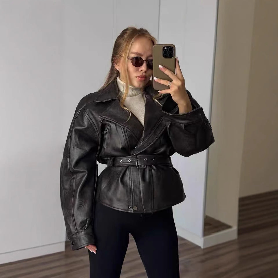 Damen Kunstlederjacke mit breitem Revers und taillierbarem Gürtel Fudus