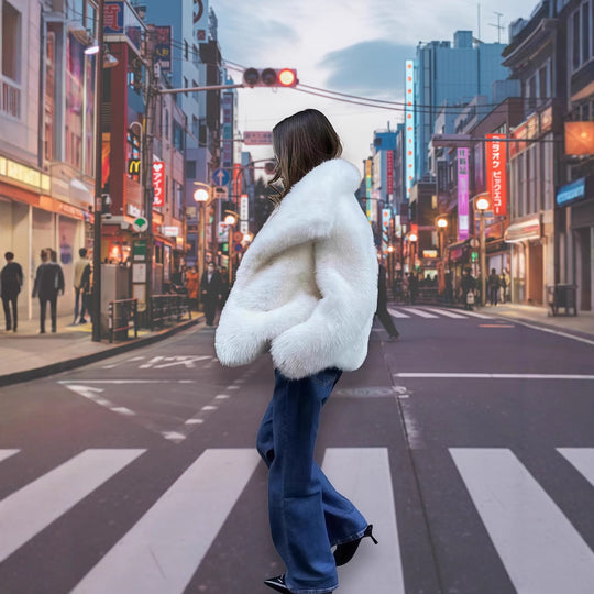 Damen Kunstfelljacke mit voluminösen Ärmeln und eleganter Verarbeitung Fudus