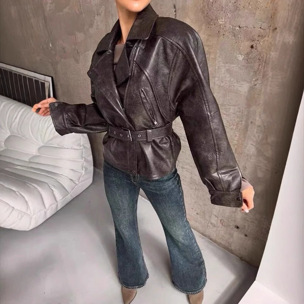 Damen Kunstlederjacke mit breitem Revers und taillierbarem Gürtel Fudus