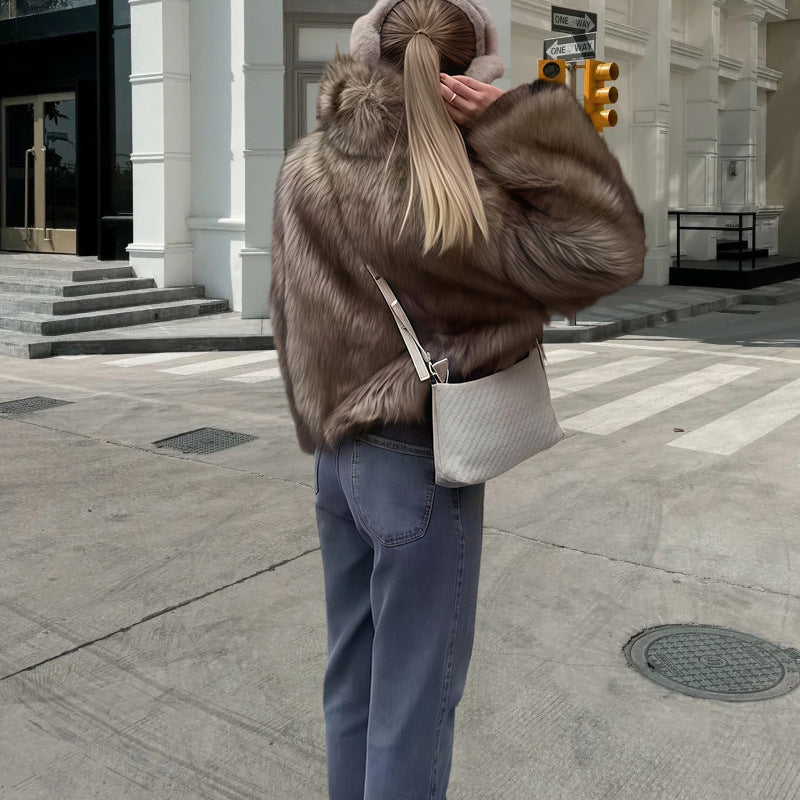 Damen Kunstfelljacke mit voluminösen Ärmeln und elegantem Schnitt Fudus