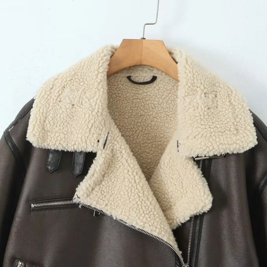 Damen Kunstfelljacke mit seitlichen Reißverschlusstaschen und Gürtel Fudus