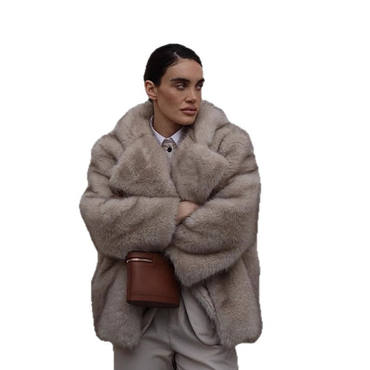 Damen Kunstfelljacke mit voluminösen Ärmeln und luxuriösem Design Fudus