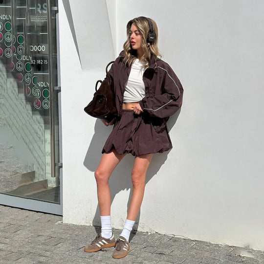 Damen lässige Sportjacke mit voluminösen Ärmeln und asymmetrischem Saum Fudus