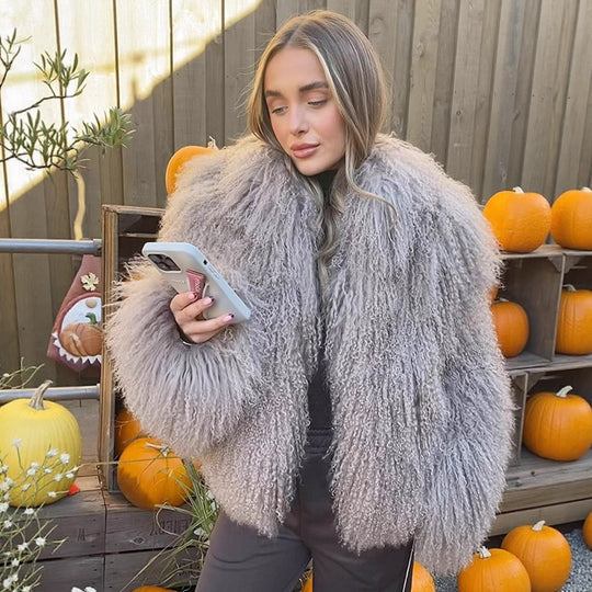 Damen Kunstfelljacke mit voluminösen Ärmeln