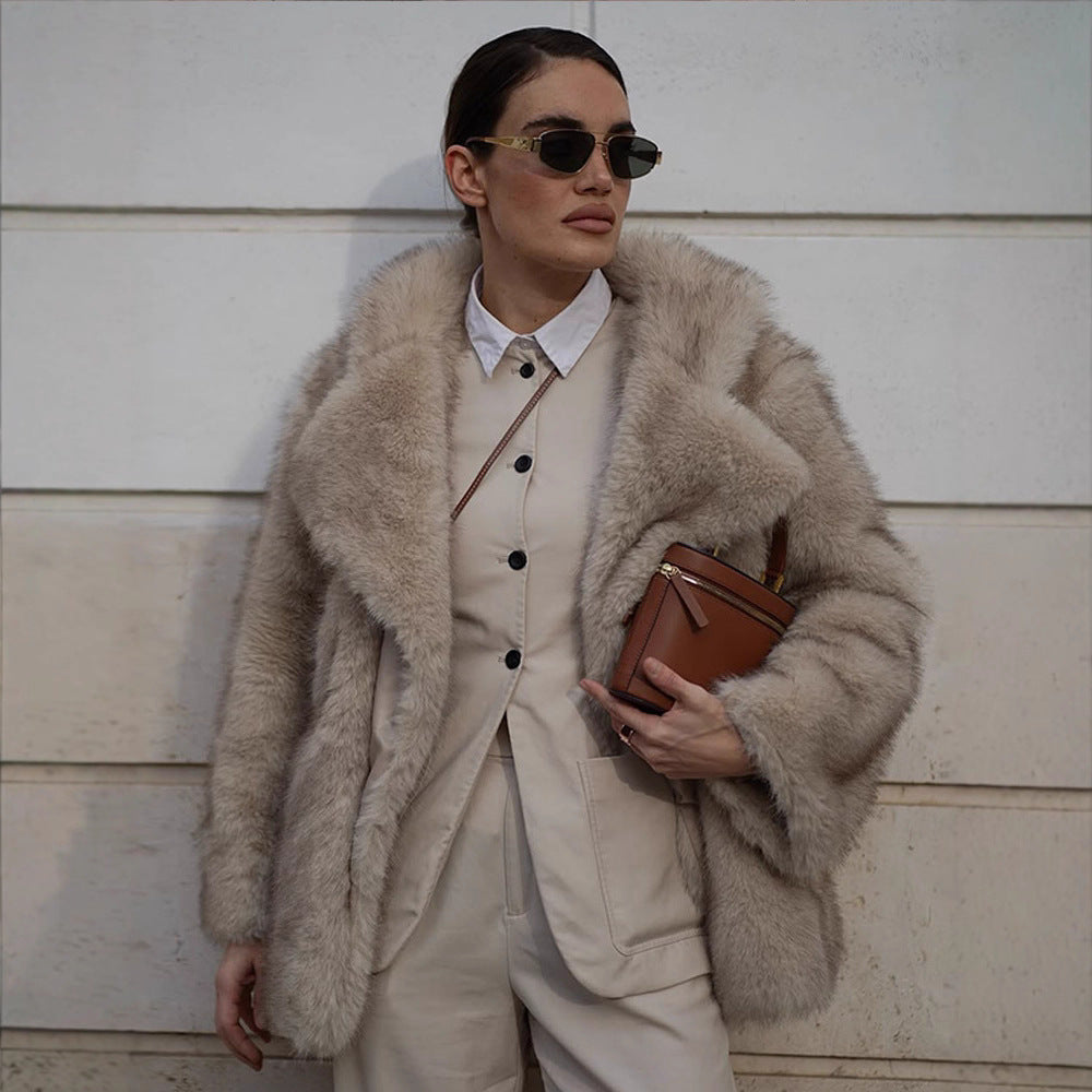 Damen Kunstfelljacke mit voluminösen Ärmeln und luxuriösem Design Fudus