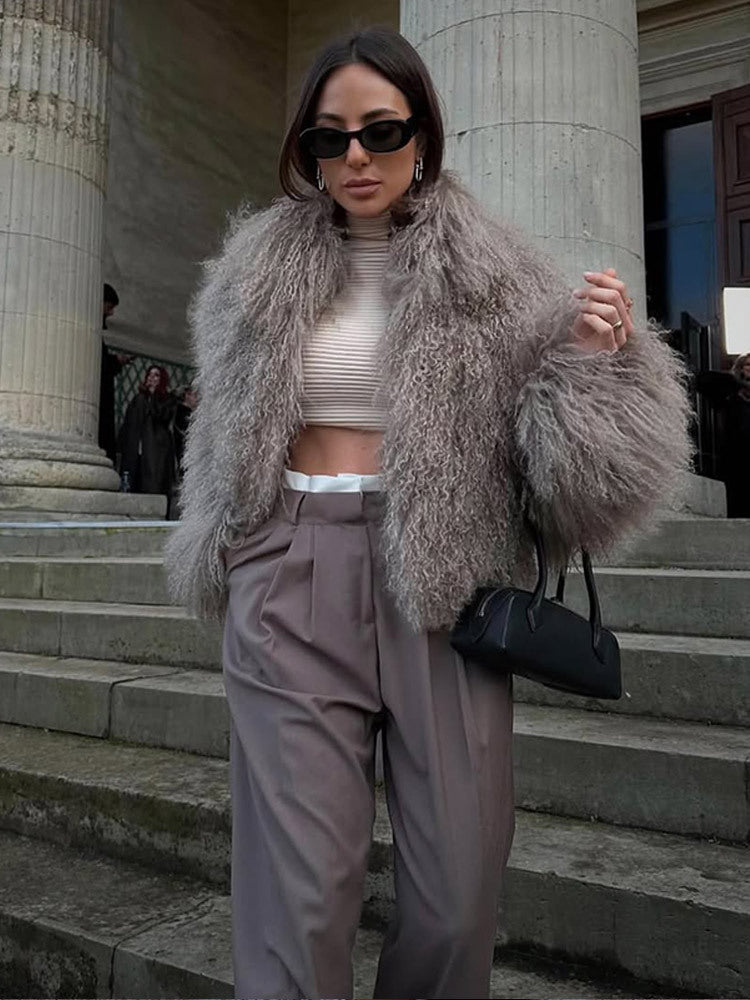 Damen Kunstfelljacke mit voluminösen Ärmeln