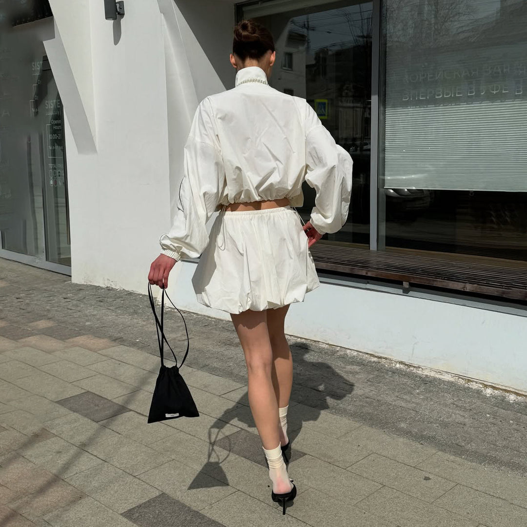 Damen lässige Sportjacke mit voluminösen Ärmeln und asymmetrischem Saum Fudus