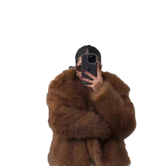 Damen Kunstfelljacke mit voluminösen Ärmeln und eleganter Verarbeitung Fudus